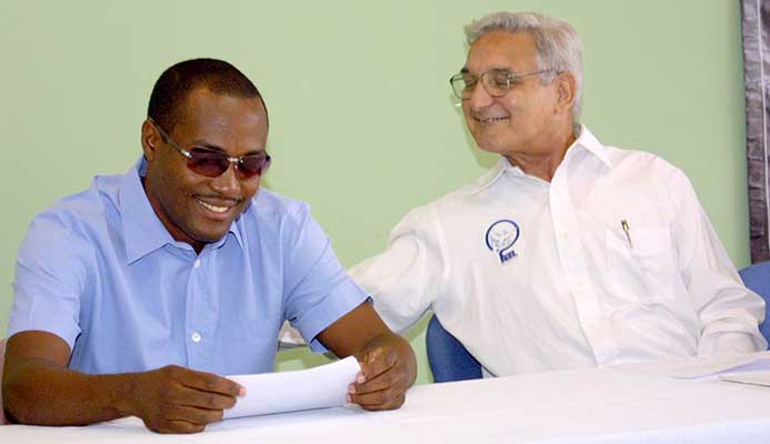 Clive Pantin with star batsman Brian Lara, a past student of Fatima College.