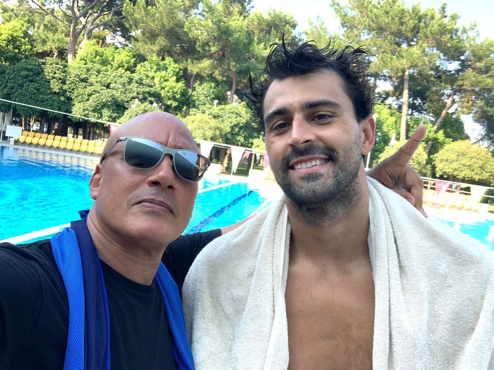 T&T swimmer Dylan Carter, right, and coach Dexter Brown share a moment at their training camp in Antalya, Turkey, in preparation for next month’s Olympic Games in Paris, France, which takes from July 26 to August 11. (Image obtained at guardian.co.tt)