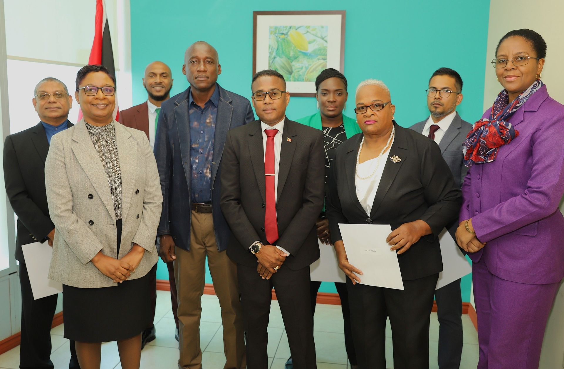Minister of Sports, Phillip Watts, centre, is flanked by newly appointed TBBC chairman Kirt Sinnette, fourth from left, and deputy chairman Kim Quashie, third from right. With them are Hemrajh Rampersad (member), from left, permanent secretary Penelope Bradshaw-Niles, Rixon Powder, MSYA sport coordinator, Kwanieze John (member), Bryan Basdeo (member), and Beverly Reid-Samuel, permanent secretary (Ag). (Image obtained at guardian.co.tt)